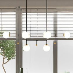 Urban Ambiance - Chandelier - UQL4560 Minimalist Indoor Chandelier, 12.25''H x 39.50''W x 17.75''D, Matte Black Finish, Center Collection -