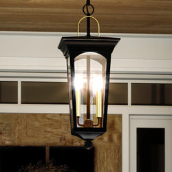 A luxury UHP1261 Cosmopolitan outdoor pendant lamp hanging from a doorway.