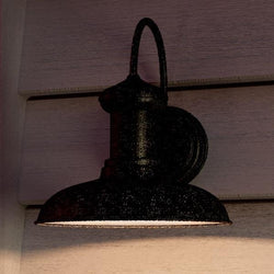 A luxury lighting fixture, the Urban Ambiance UHP1028 Industrial Chic Outdoor Wall Light adds a beautiful touch to any house with its Olde Iron Finish from the Palermo Collection.