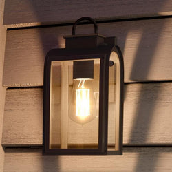 An UHP1100 Art Deco Outdoor Wall Light, 13.25"H x 6.5"W, Oil Rubbed Bronze Finish from the Chesterfield Collection by Urban Ambiance on a