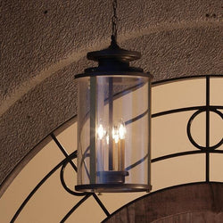 Gorgeous UHP1124 Rustic Outdoor Pendant Lighting Fixture from the Plymouth Collection, manufactured by Urban Ambiance, hanging from a doorway.