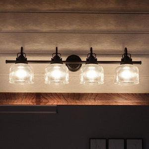 An UHP2047 Industrial Chic Bath Fixture with four unique glass shades, from the Harlowe Collection of Urban Ambiance.