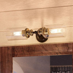A luxurious bathroom with two gorgeous UHP2060 Industrial Chic Chic Bathroom Vanity Lights hanging above a mirror.