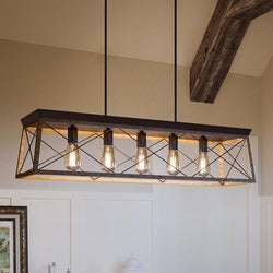 A UHP2126 Industrial Chic Linear Chandelier from the Berkeley Collection by Urban Ambiance in Olde Bronze Finish, measuring 9"H x 38"W, is installed as a unique light fixture