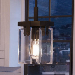 A UHP2446 Modern Farmhouse Modern Pendant, 11-7/8"H x 6-1/2"W SQ, Olde Bronze Finish, Bristol Collection luxury lighting fixture hanging over