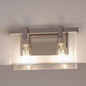 A modern farmhouse bath fixture featuring a brushed nickel finish and two lights.
