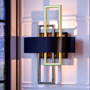 A unique UHP2783 Modern Wall Sconce with a black frame, part of Urban Ambiance's Vegas Collection.