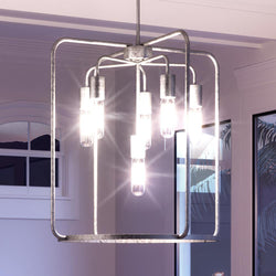 A gorgeous pendant lamp from the Loveland Collection by Urban Ambiance hanging in a living room.