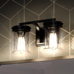 A bathroom with a gorgeous UHP3751 French Country Bath Vanity Lighting fixture.