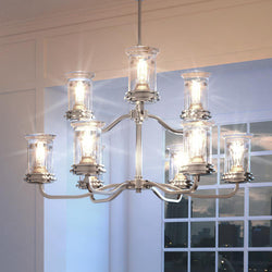 A gorgeous UHP3800 French Country Chandelier lighting fixture in a room with a large window.