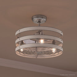 An Urban Ambiance UHP9030 Modern Farmhouse Indoor Ceiling Fan, 18.1"H x 23.5"W, Galvanized Steel, Adelaide Collection with three lights in a room.