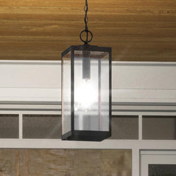 An Urban Ambiance UQL1354 Modern Farmhouse Outdoor Pendant Light with a beautiful glass shade.