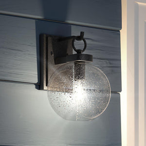 A luxurious Urban Ambiance UQL1511 Contemporary Outdoor Wall Light with a gorgeous glass globe.