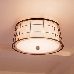 A beautiful Craftsman Flush Ceiling Light, 9"H x 16"W, Dark Bronze Finish from the Johannesburg Collection by Urban Ambiance with a white shade.