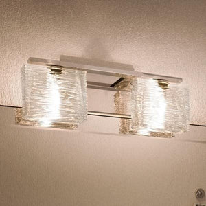 A unique UQL2721 Modern Bathroom Light fixture with a glass shade from Urban Ambiance.