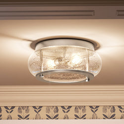 A beautiful Urban Ambiance ceiling light with a unique UQL3290 Utilitarian Ceiling Light, 5.75"H x 12"W, Brushed Nickel Finish, Clearwater Collection round