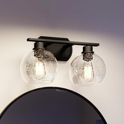 A beautiful Urban Ambiance bathroom vanity with the UQL3455 Utilitarian Bath Vanity Light, 8.5"H x 16.5"W, Matte Black Finish from the Waterbury Collection and