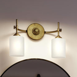 An Urban Ambiance bathroom with a unique UQL3492 Mid-Century Modern Bath Vanity Lamp, 10"H x 15"W, Rustic Brass Finish, Rialto Collection and a