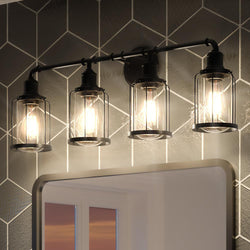 A luxury bathroom with a gorgeous UQL3500 Industrial Chic Bath Vanity Light from the Hillsboro Collection, by Urban Ambiance, over a mirror.