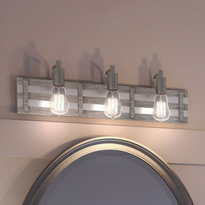 Three UEX2297 Modern Farmhouse Bath Lights 7''H x 23''W, Satin Nickel Finish, Eastport Collection lighting fixture hanging above a mirror in a bathroom.