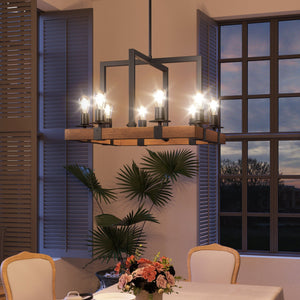 A dining room with a luxurious lighting fixture, the Urban Ambiance UFS2012 Modern Farmhouse Chandelier, hanging over a table.