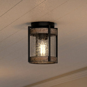 A beautiful UHP1352 Farmhouse Outdoor Ceiling Light 8''H x 7.375''W, Midnight Black Finish, Newark Collection by Urban Ambiance with a glass shade.