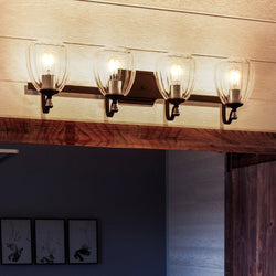 A gorgeous Crystal Bathroom Vanity Light, 7.5"H x 32"W, Olde Bronze Finish from the Ravenna Collection hanging over it.
