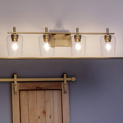 A bathroom with a unique Swan-Hill Collection light fixture by Urban Ambiance and a barn door.