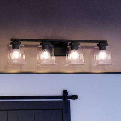 A bathroom with a unique lighting fixture.