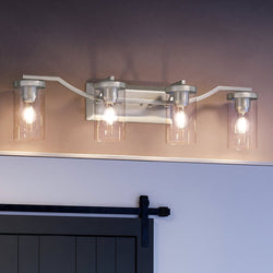 A beautiful bathroom with a unique UHP4364 Contemporary Bath Light 8''H x 34''W, Brushed Nickel Finish, Mesa Collection and an Urban Ambiance barn door.