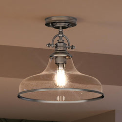 An Urban Ambiance UQL3669 Traditional Ceiling 12.5''H x 13.5''W, Brushed Nickel Finish, Pasadena Collection light fixture with a beautiful glass shade and a