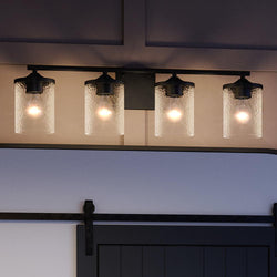 A gorgeous bathroom with a unique Urban Ambiance UQL3818 Modern Farmhouse Bath Fixture 7.75''H x 28''W, Matte Black Finish, Bideford Collection light fixture