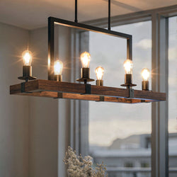 The Urban Ambiance UFS2010 Modern Farmhouse Chandelier from the Broadway Collection, 15''H x 33''W with a matte black and rich walnut finish, hangs in a modern room with large windows.
