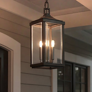 The Urban Ambiance UHP1191 Colonial Outdoor Pendant Light (23-3/4" x 9-1/2") in Olde Bronze from the Calderdale Collection is an elegant farmhouse lighting choice with a classic lantern design.