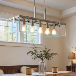 The Urban Ambiance UHP2441 Bristol Collection Modern Farmhouse Chandelier, 15-3/4"H x 36-3/4"W in brushed nickel, features six exposed bulbs for stylish architectural lighting above your dining table.