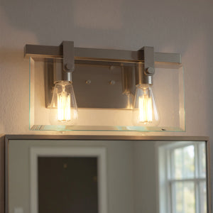 The Urban Ambiance UHP2453 Modern Farmhouse Bath Fixture from the Bristol Collection features two bulbs and a brushed nickel finish, bringing sleek, contemporary style to your bathroom décor above the mirror. Measures 8-3/8"H x 14-7/8"W.