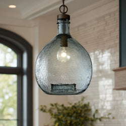 Close-up of the UHP2771 Modern Farmhouse Pendant by Urban Ambiance, featuring a handcrafted glass shade and Olde Bronze finish from the Hobart Collection, hanging in a modern kitchen setting.