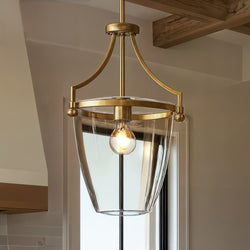 The Urban Ambiance UHP4255 Transitional Pendant from the Coronado Collection features a brushed bronze finish and open-frame design, measuring 16.75''H x 11.5''W—perfect for contemporary interiors.