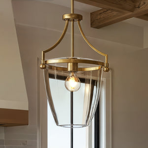 The Urban Ambiance UHP4255 Transitional Pendant from the Coronado Collection features a brushed bronze finish and open-frame design, measuring 16.75''H x 11.5''W—perfect for contemporary interiors.