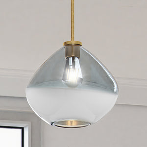 The Urban Ambiance ULB2290 Mid-Century Modern Pendant from the Conwy Collection features a 10''H x 11''W stained glass shade and brushed brass finish, elegantly hanging near a window for a stylish modern touch.