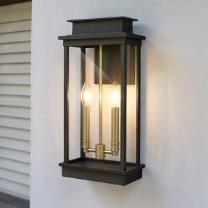 The Urban Ambiance UQL1821 Selby Collection Outdoor Wall Sconce, 18.75"H, features a matte black finish and modern design with two candle-style bulbs, perfect for elegant outdoor lighting.