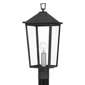 The Urban Ambiance UQL1874 Modern Rustic Outdoor Post Light from the Elmwood Collection features seeded glass panels, a visible bulb, marine-grade construction, and a mottled black finish. Measures 22