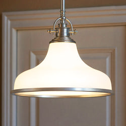 The Urban Ambiance UQL2333 Industrial Pendant, featuring a brushed nickel finish and wide frosted glass shade, adds modern elegance with industrial flair to any space. From the Pasadena Collection, it measures 11.5"H x 13.5"W.
