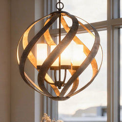 The UQL2781 Rustic Chandelier by Urban Ambiance features a weathered black finish, spiral metal bands, and four candle-style lights, measuring 23"H x 19.5"W from the Walsall Collection.