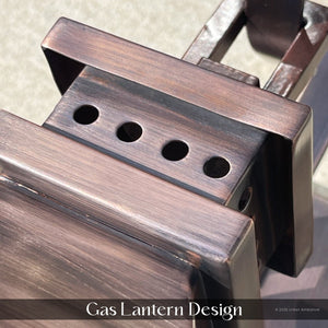 Close-up of the UFS1000 Transitional Outdoor Wall Sconce by Urban Ambiance, featuring a dark-patina genuine copper top with vent holes and brushed finish from the Calderdale Collection. Text at bottom: 