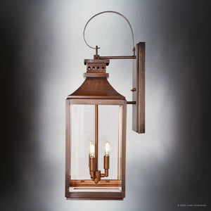 The Urban Ambiance UFS1002, from the Calderdale Collection, is a transitional outdoor wall sconce in genuine copper with a dark-patina finish, measuring 28.5''H x 9.5''W—perfect for enhancing exterior spaces.