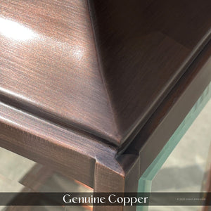 Close-up of the Urban Ambiance UFS1002 Calderdale Collection wall sconce in genuine copper with dark-patina finish, showcasing its colonial-inspired beveled glass and 