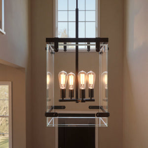 The Urban Ambiance UHP2442 Modern Farmhouse Modern Chandelier from the Bristol Collection features a square glass pendant design with an Olde Bronze finish and five exposed bulbs, measuring 28-3/8″ high by 14-3/4″ wide—ideal for bringing a touch of modern farmhouse style to tall rooms with large windows.