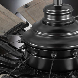 Close-up of a Tuscan Indoor Ceiling Fan mechanism by Urban Ambiance from the Saybrook Collection, featuring a matte black body. The detailed view highlights its 60