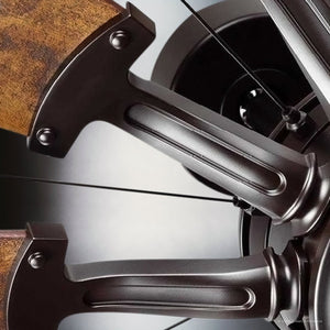 Close-up of the UHP9480 Tuscan Indoor Ceiling Fan from Urban Ambiance's Saybrook Collection, highlighting its detailed metalwork and architectural bronze finish, showcasing its uniquely crafted precision.